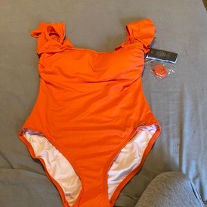 Full swimsuit for Lady.  New with labels.  size 8 brand Vince Camuto.